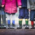 Children wearing muddy wellies